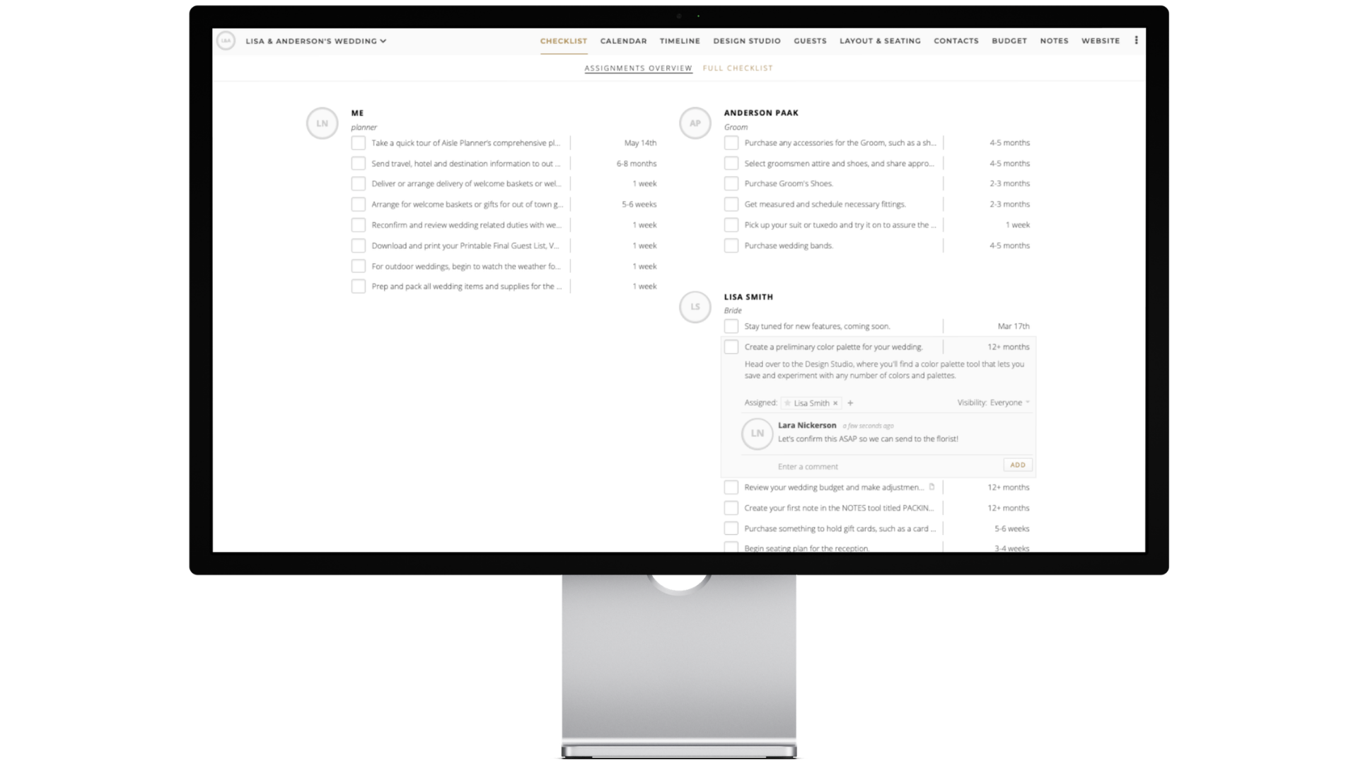 A desktop monitor displays the Aisle Planner Pro wedding checklist and project management dashboard, featuring task assignments for planners and couples to streamline event coordination.