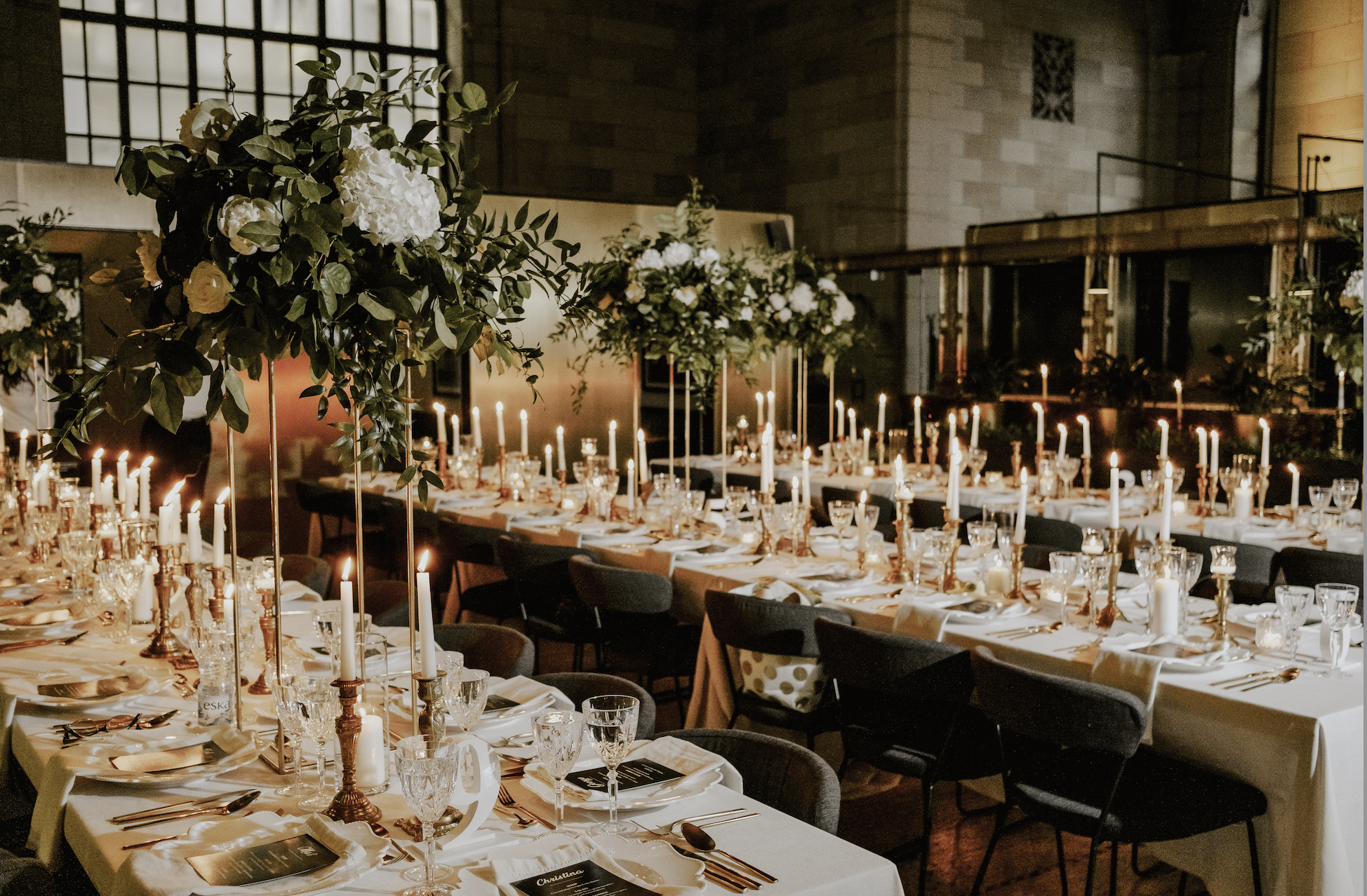 Rows of tables with candles